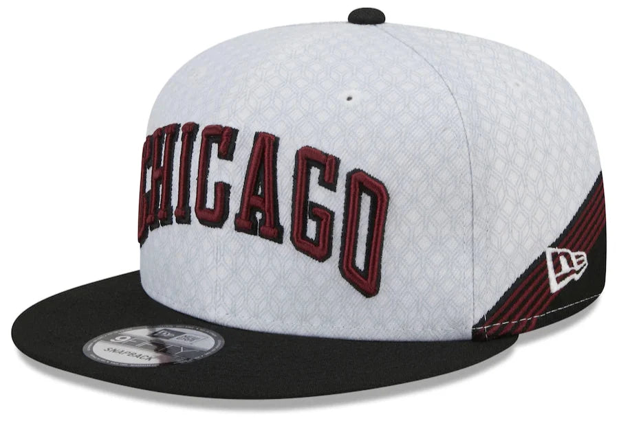 Men's Chicago Bulls New Era Black 2022/23 City Edition Official 9FIFTY Snapback Adjustable Hat